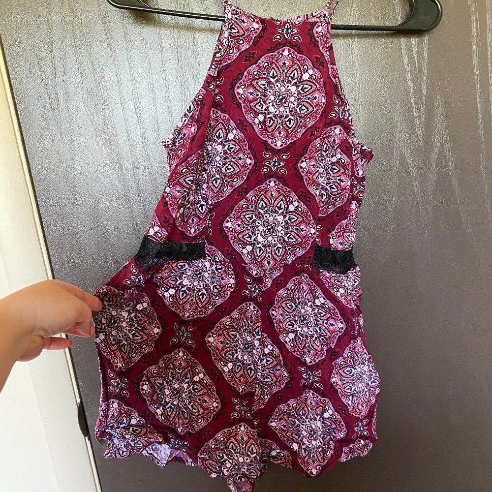 Super fun romper with cutouts!